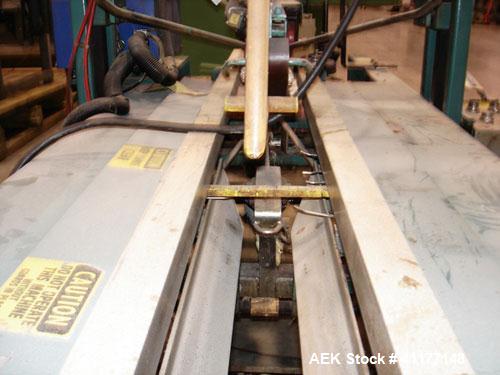 Used General Corrugated Hot Melt Top and Bottom Case Sealer, Model 2000. Includes a Nordson HM V glue unit, model 244305, Serial #A2L01286. 3/60/220V.
