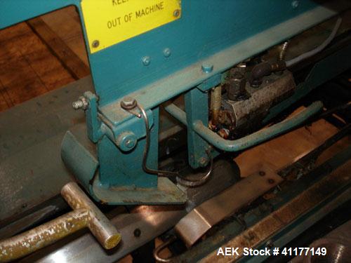 Used General Corrugated Hot Melt Top and Bottom Case Sealer, Model 2000. Includes a Nordson HM V glue unit, model 244305, Serial #A9G06461. 3/60/220V.