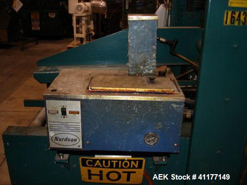 Used General Corrugated Hot Melt Top and Bottom Case Sealer, Model 2000. Includes a Nordson HM V glue unit, model 244305, Serial #A9G06461. 3/60/220V.
