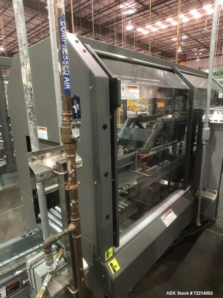 Used Pearson Model CS25-G Automatic Hot Melt Top Case Sealer.