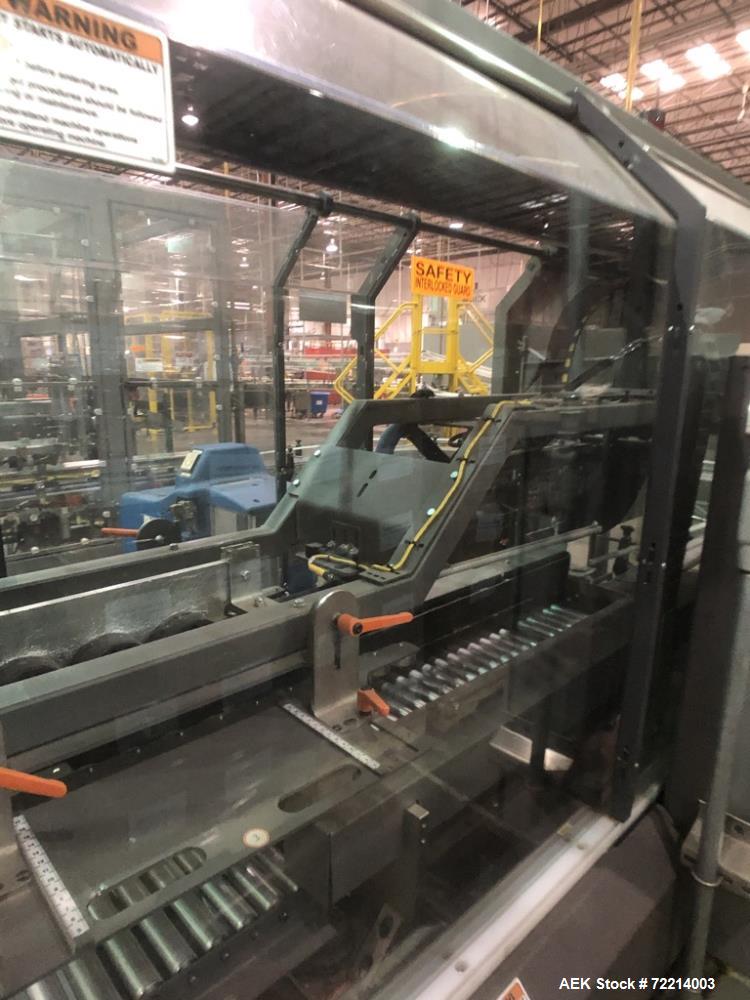 Used Pearson Model CS25-G Automatic Hot Melt Top Case Sealer.