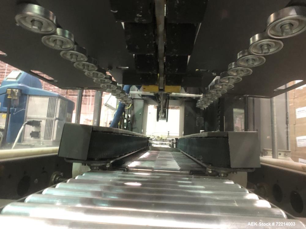Used Pearson Model CS25-G Automatic Hot Melt Top Case Sealer.