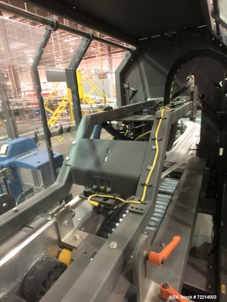 Used Pearson Model CS25-G Automatic Hot Melt Top Case Sealer.