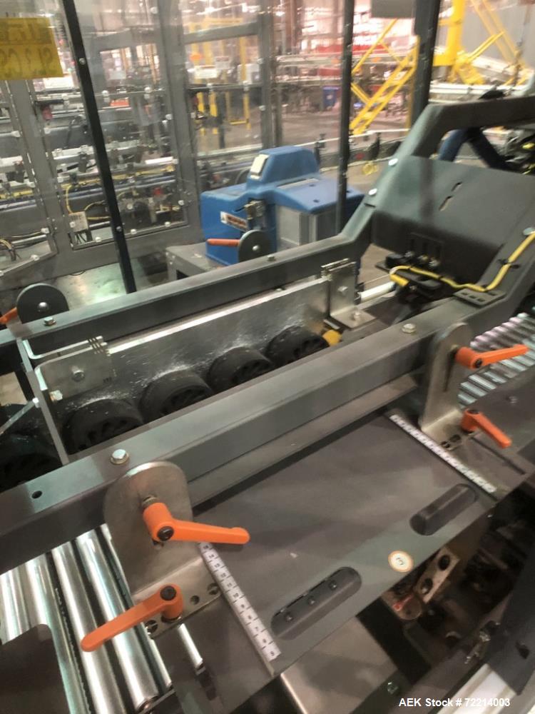 Used Pearson Model CS25-G Automatic Hot Melt Top Case Sealer.