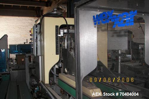 Used Used: Wexxar TB6 Hot Melt case sealer. Automatic small footprint top and bottom case sealer. Has Nordson 3500 glue unit.
