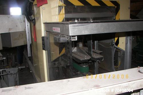 Used Used: Wexxar TB6 Hot Melt case sealer. Automatic small footprint top and bottom case sealer. Has Nordson 3500 glue unit.
