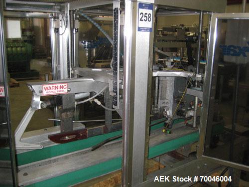 Used Wexxar Top Only Automatic Case Sealer, Model WST-07. Capable of speeds up to 35 cases per minute. Has a case size range: Length 12" to 32" (305mm to 838mm), Width 10" to 22.5" (254mm to 572mm), ...