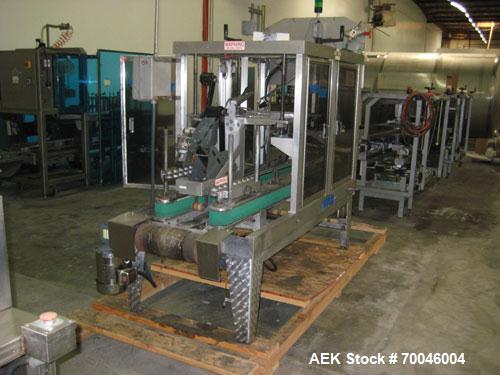 Used Wexxar Top Only Automatic Case Sealer, Model WST-07. Capable of speeds up to 35 cases per minute. Has a case size range: Length 12" to 32" (305mm to 838mm), Width 10" to 22.5" (254mm to 572mm), ...