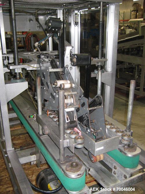 Used Wexxar Top Only Automatic Case Sealer, Model WST-07. Capable of speeds up to 35 cases per minute. Has a case size range: Length 12" to 32" (305mm to 838mm), Width 10" to 22.5" (254mm to 572mm), ...