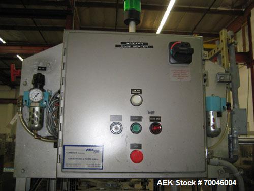 Used Wexxar Top Only Automatic Case Sealer, Model WST-07. Capable of speeds up to 35 cases per minute. Has a case size range: Length 12" to 32" (305mm to 838mm), Width 10" to 22.5" (254mm to 572mm), ...