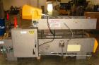 Used Elliott Top Only Hot Melt Case Sealer, ModelHMT-MINI. Capable of speeds up to 40 cpm. The extra-short Elliott HMT-MINI is only 9' 2