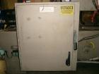 Used Elliott Top Only Hot Melt Case Sealer, ModelHMT-MINI. Capable of speeds up to 40 cpm. The extra-short Elliott HMT-MINI is only 9' 2