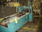 Used General Corrugated Hot Melt Top and Bottom Case Sealer, Model 2000. Includes a Nordson HM V glue unit, model 244305, Serial #A9G06461. 3/60/220V.