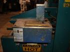 Used General Corrugated Hot Melt Top and Bottom Case Sealer, Model 2000. Includes a Nordson HM V glue unit, model 244305, Serial #A9G06461. 3/60/220V.