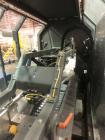 Used Pearson Model CS25-G Automatic Hot Melt Top Case Sealer.
