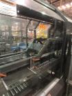 Used Pearson Model CS25-G Automatic Hot Melt Top Case Sealer.