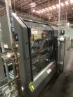 Used Pearson Model CS25-G Automatic Hot Melt Top Case Sealer.