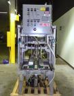 Used Wexxar Model WSH Automatic Top Only Glue Case Sealer capable of speeds up to 35 cases per minute. Case size range: Length 12