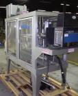 Used Wexxar Model WSH Automatic Top Only Glue Case Sealer capable of speeds up to 35 cases per minute. Case size range: Length 12