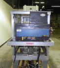 Used Wexxar Model WSH Automatic Top Only Glue Case Sealer capable of speeds up to 35 cases per minute. Case size range: Length 12