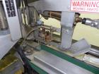 Used- Wexxar Model WSH Automatic Top Only Glue Case Sealer capable of speeds up to 35 cases per minute. Case size range: Len...