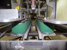 Used- Wexxar Model WSH Automatic Top Only Glue Case Sealer capable of speeds up to 35 cases per minute. Case size range: Len...