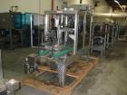 Used Wexxar Top Only Automatic Case Sealer, Model WST-07. Capable of speeds up to 35 cases per minute. Has a case size range: Length 12