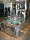 Used Wexxar Top Only Automatic Case Sealer, Model WST-07. Capable of speeds up to 35 cases per minute. Has a case size range: Length 12