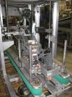 Used Wexxar Top Only Automatic Case Sealer, Model WST-07. Capable of speeds up to 35 cases per minute. Has a case size range: Length 12
