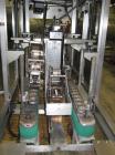 Used Wexxar Top Only Automatic Case Sealer, Model WST-07. Capable of speeds up to 35 cases per minute. Has a case size range: Length 12