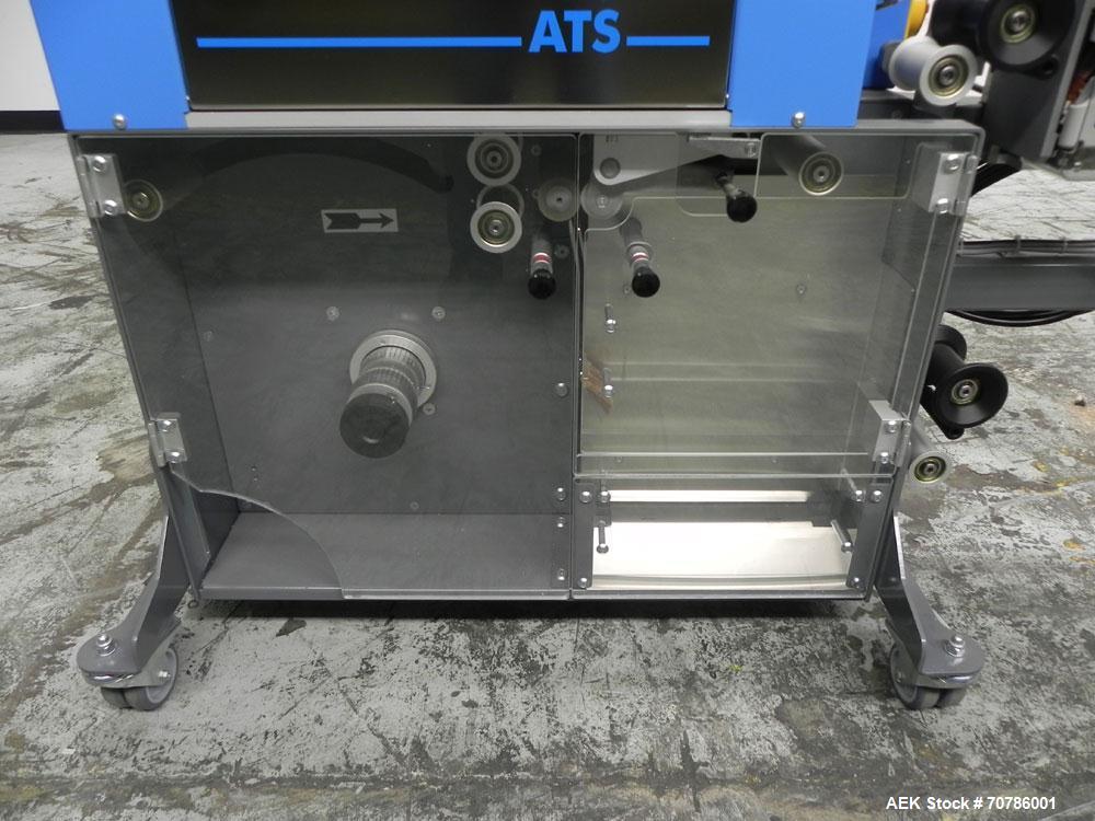Unused- ATS (Felins) Model US-2100 Wide Format Banding Machine. Machine is capable of speeds up to 25-30 bandings per minute. Uses a "wide format" band width sizes of 3" (75mm) to 4" ( 100mm). Has an...