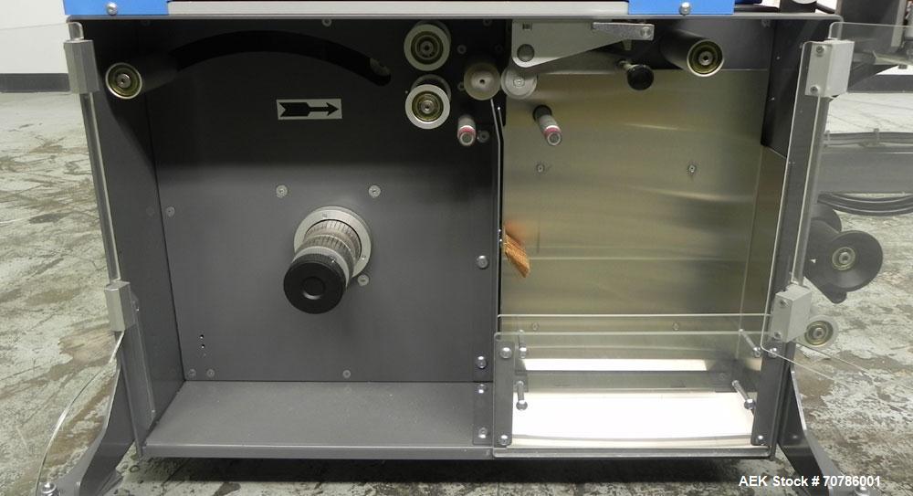 Unused- ATS (Felins) Model US-2100 Wide Format Banding Machine. Machine is capable of speeds up to 25-30 bandings per minute. Uses a "wide format" band width sizes of 3" (75mm) to 4" ( 100mm). Has an...