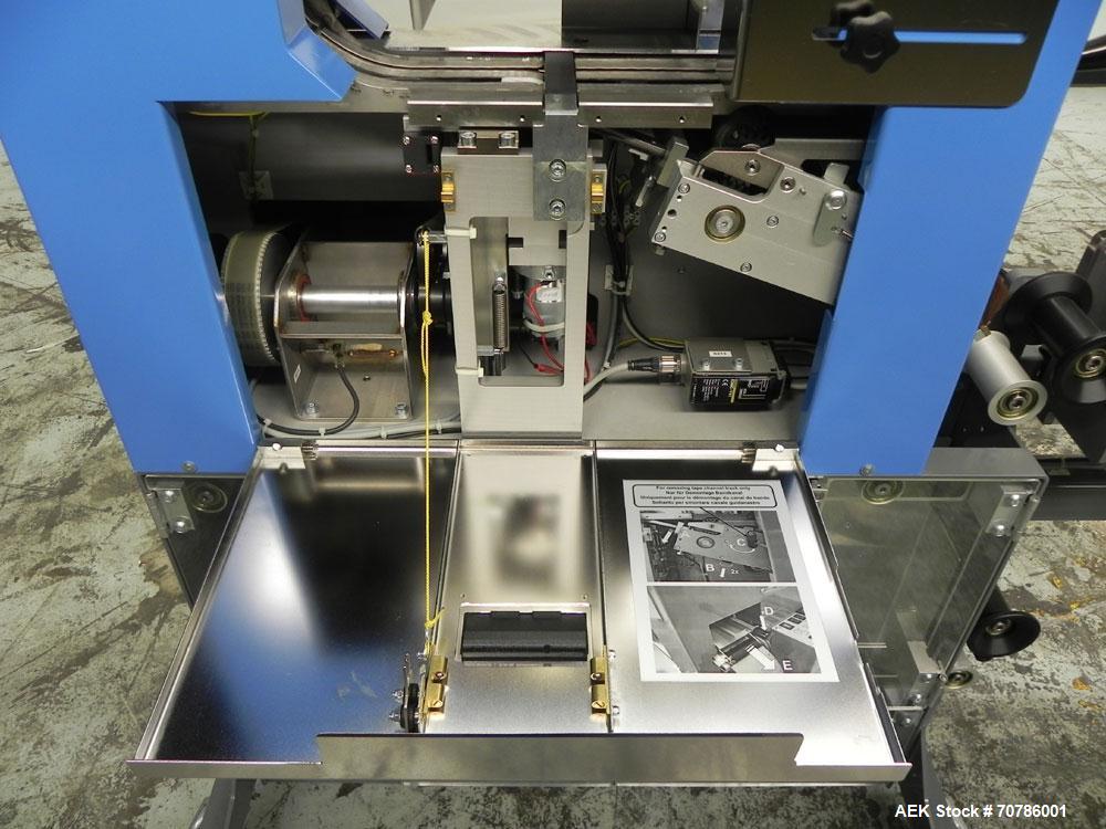 Unused- ATS (Felins) Model US-2100 Wide Format Banding Machine. Machine is capable of speeds up to 25-30 bandings per minute. Uses a "wide format" band width sizes of 3" (75mm) to 4" ( 100mm). Has an...