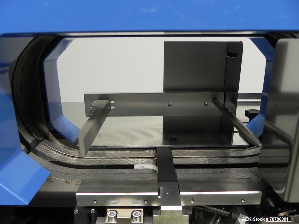 Unused- ATS (Felins) Model US-2100 Wide Format Banding Machine. Machine is capable of speeds up to 25-30 bandings per minute. Uses a "wide format" band width sizes of 3" (75mm) to 4" ( 100mm). Has an...