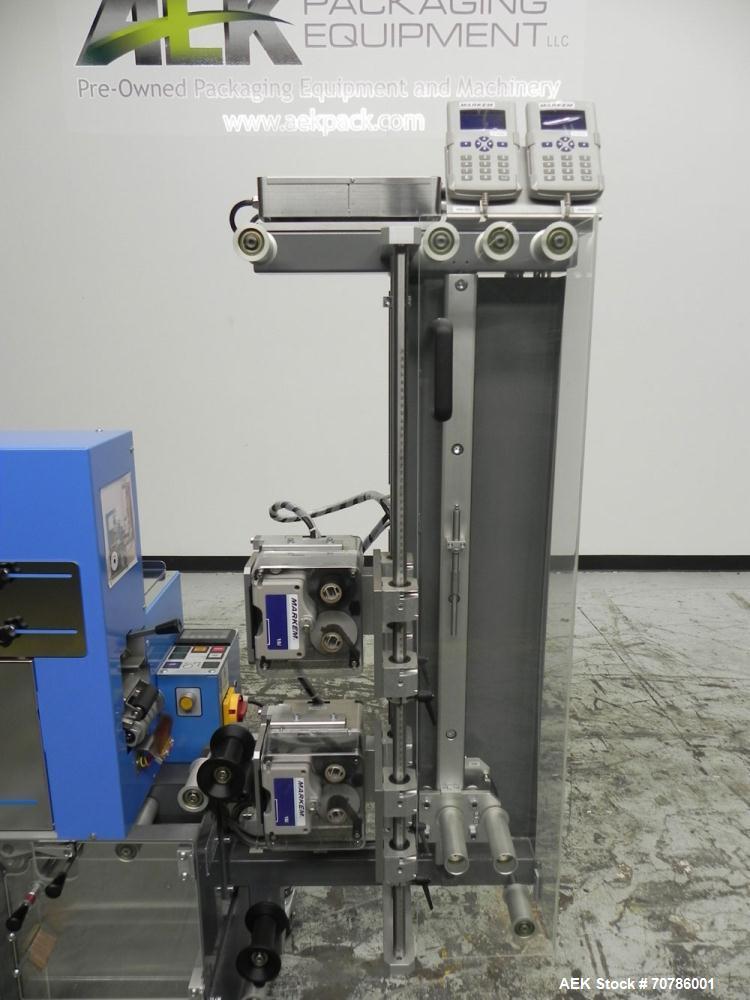 Unused- ATS (Felins) Model US-2100 Wide Format Banding Machine. Machine is capable of speeds up to 25-30 bandings per minute. Uses a "wide format" band width sizes of 3" (75mm) to 4" ( 100mm). Has an...