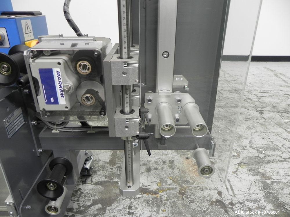 Unused- ATS (Felins) Model US-2100 Wide Format Banding Machine. Machine is capable of speeds up to 25-30 bandings per minute. Uses a "wide format" band width sizes of 3" (75mm) to 4" ( 100mm). Has an...
