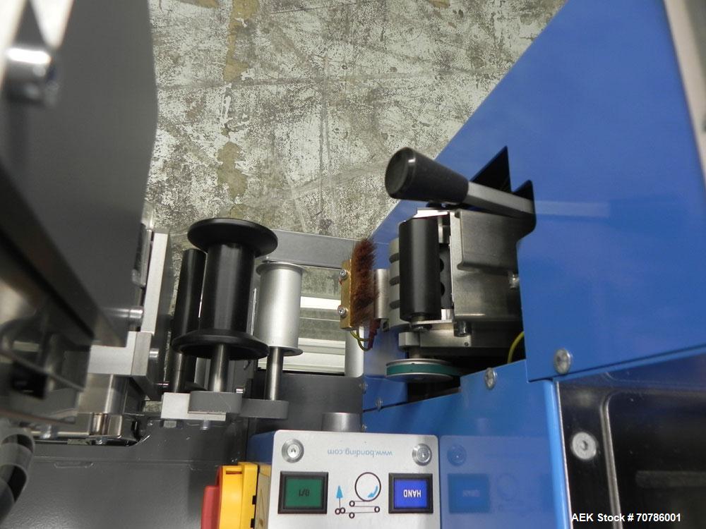 Unused- ATS (Felins) Model US-2100 Wide Format Banding Machine. Machine is capable of speeds up to 25-30 bandings per minute. Uses a "wide format" band width sizes of 3" (75mm) to 4" ( 100mm). Has an...