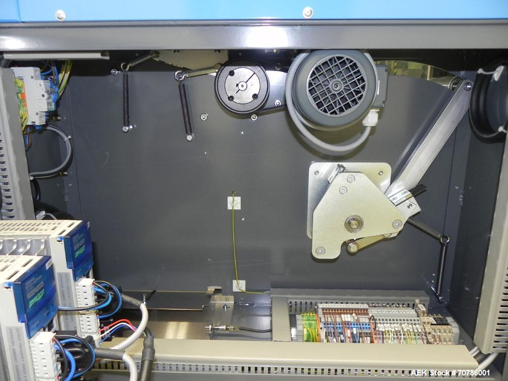 Unused- ATS (Felins) Model US-2100 Wide Format Banding Machine. Machine is capable of speeds up to 25-30 bandings per minute. Uses a "wide format" band width sizes of 3" (75mm) to 4" ( 100mm). Has an...