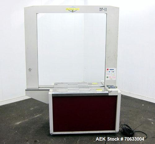 Used Dynaric Automatic Model DF-11 Bottom Seal Strapping Machine.Capable of 1.6 second cycle time, and up to 37 straps per minute. has an 'Arch' opening of 44.5" (wide) X 48"(tall).1/115 volt, 8.2 am...