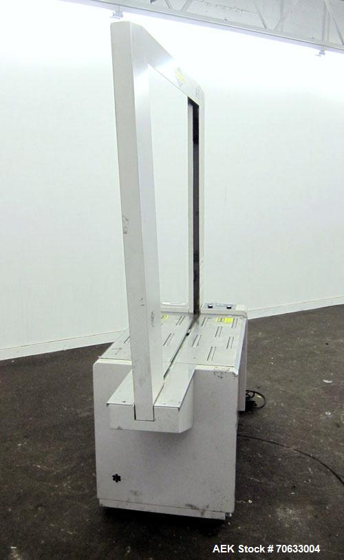 Used Dynaric Automatic Model DF-11 Bottom Seal Strapping Machine.Capable of 1.6 second cycle time, and up to 37 straps per minute. has an 'Arch' opening of 44.5" (wide) X 48"(tall).1/115 volt, 8.2 am...