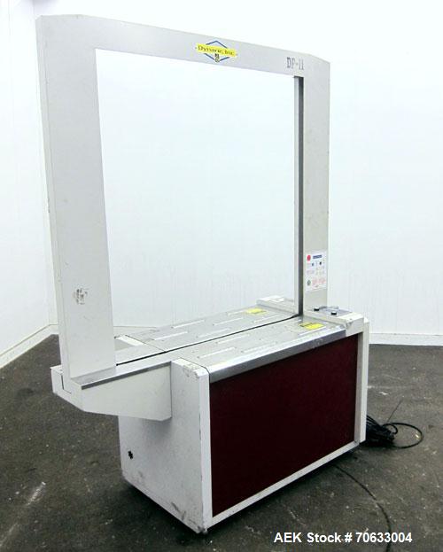 Used Dynaric Automatic Model DF-11 Bottom Seal Strapping Machine.Capable of 1.6 second cycle time, and up to 37 straps per minute. has an 'Arch' opening of 44.5" (wide) X 48"(tall).1/115 volt, 8.2 am...
