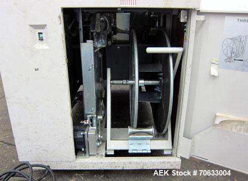 Used Dynaric Automatic Model DF-11 Bottom Seal Strapping Machine.Capable of 1.6 second cycle time, and up to 37 straps per minute. has an 'Arch' opening of 44.5" (wide) X 48"(tall).1/115 volt, 8.2 am...