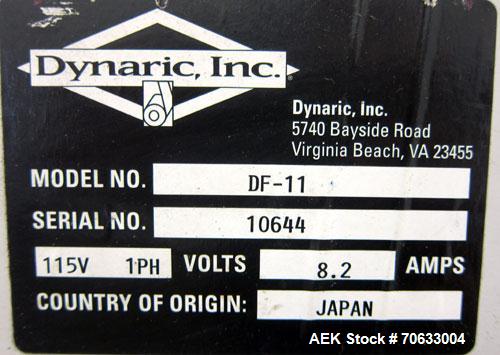 Used Dynaric Automatic Model DF-11 Bottom Seal Strapping Machine.Capable of 1.6 second cycle time, and up to 37 straps per minute. has an 'Arch' opening of 44.5" (wide) X 48"(tall).1/115 volt, 8.2 am...