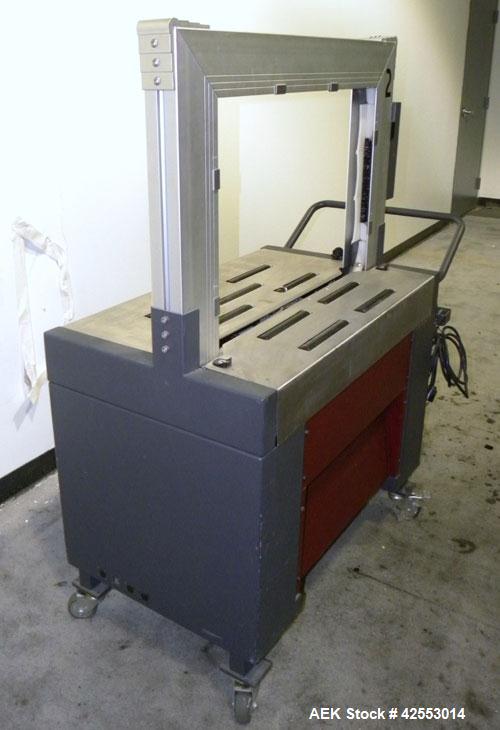 Used Ovalstrapping Modular Strapping Machine, Series JO, Carbon Steel. Approximately 52 straps per minute. Plastic strap size 6, 9, 12, and 15mm, heat seal.1/60/115 volt.Arch is 19"Hx 29"W Mounted on...