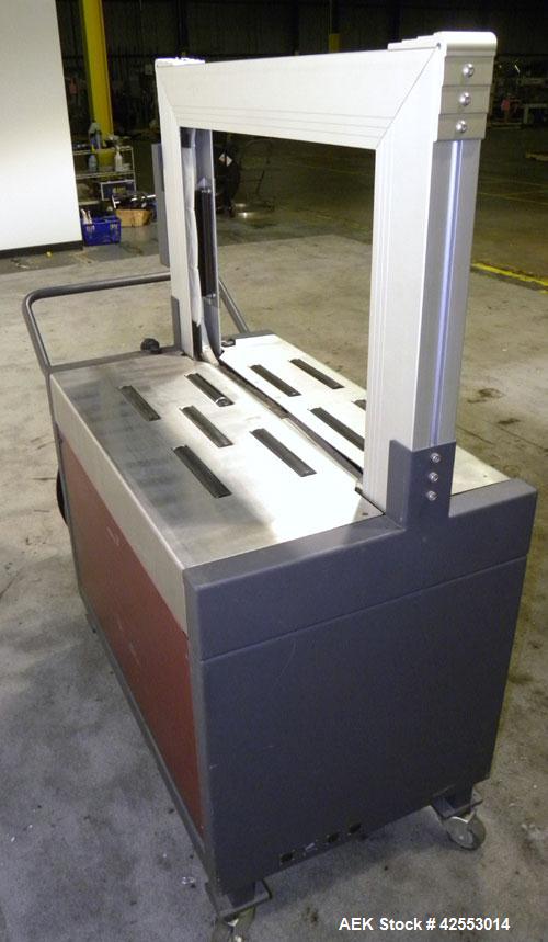 Used Ovalstrapping Modular Strapping Machine, Series JO, Carbon Steel. Approximately 52 straps per minute. Plastic strap size 6, 9, 12, and 15mm, heat seal.1/60/115 volt.Arch is 19"Hx 29"W Mounted on...