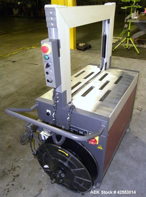 Used Ovalstrapping Modular Strapping Machine, Series JO, Carbon Steel. Approximately 52 straps per minute. Plastic strap size 6, 9, 12, and 15mm, heat seal.1/60/115 volt.Arch is 19"Hx 29"W Mounted on...