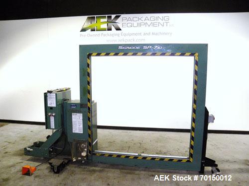 Used Signode Side Seal Plastic Strapping Machine, model SP-710, carbon steel. Production rate will vary on package size. 62’’ wide x 62’’ tall chute opening, maximum package size 60’’ x 60’’. Mounted...