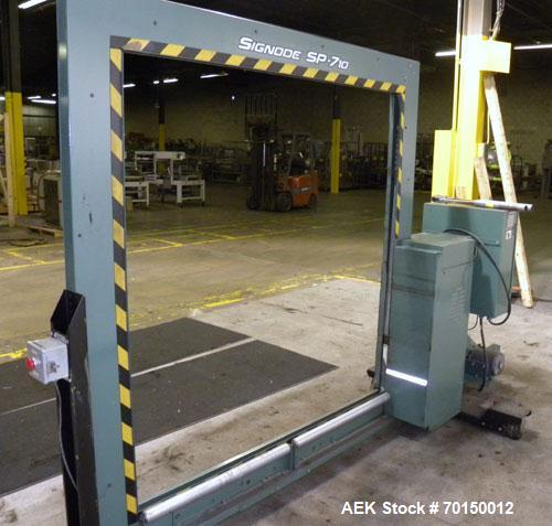 Used Signode Side Seal Plastic Strapping Machine, model SP-710, carbon steel. Production rate will vary on package size. 62’’ wide x 62’’ tall chute opening, maximum package size 60’’ x 60’’. Mounted...