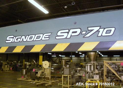 Used Signode Side Seal Plastic Strapping Machine, model SP-710, carbon steel. Production rate will vary on package size. 62’’ wide x 62’’ tall chute opening, maximum package size 60’’ x 60’’. Mounted...