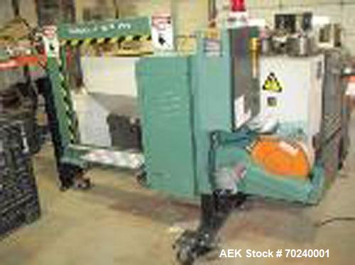 Used Signode Strapping Machine, Model SP710.  36" x 36" box, approximately 12 rolls of strapping, 220/3 phase.